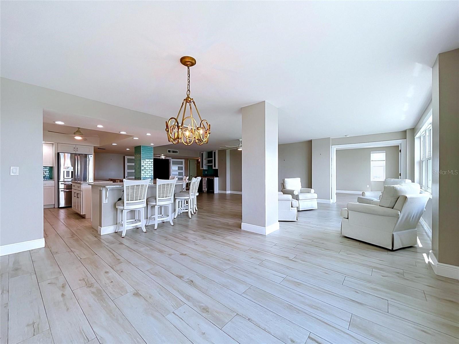 Spacious dining room with waterfront views.