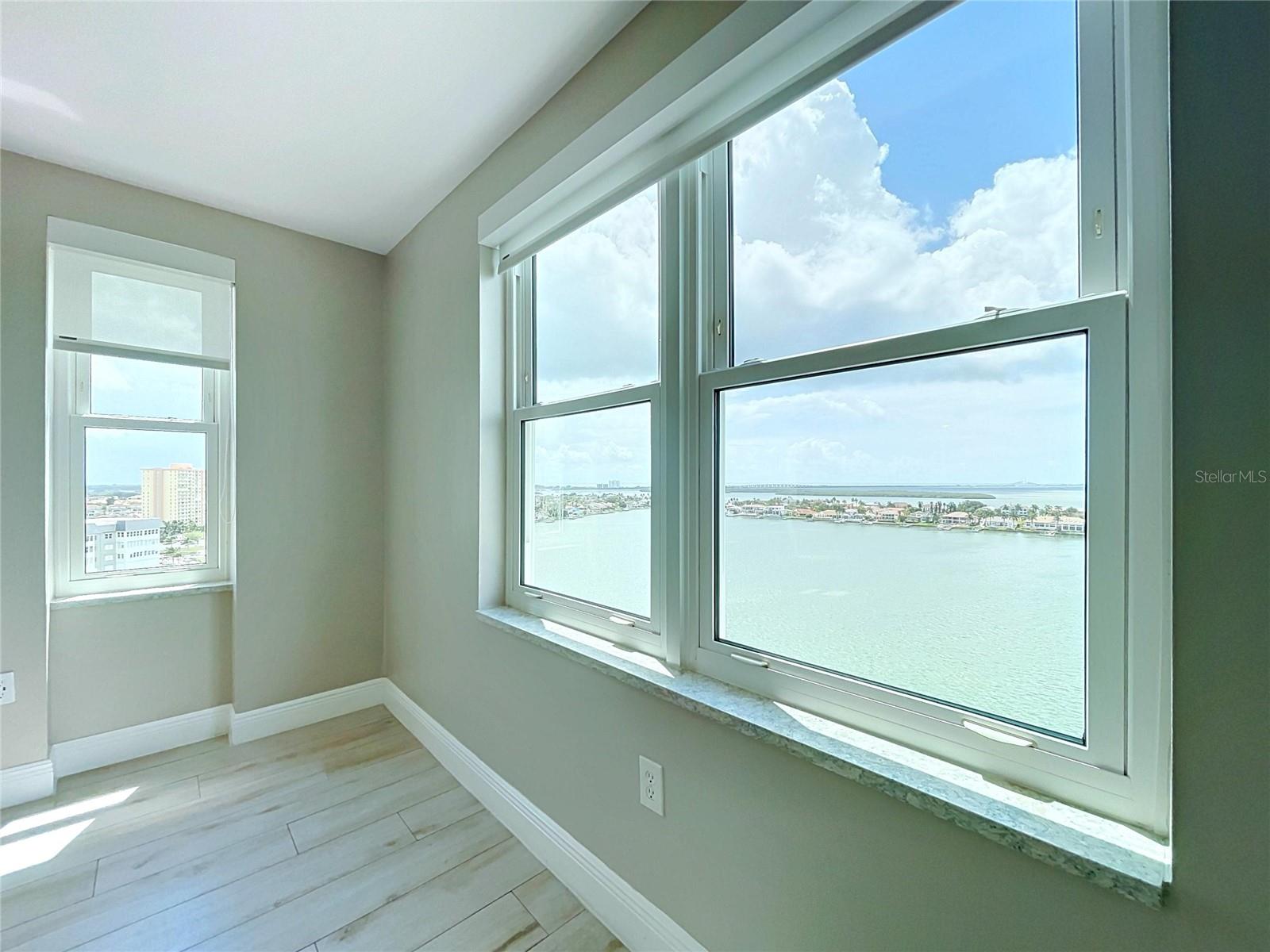 Wake up to the sunrise over Tampa Bay from your Primary Suite.