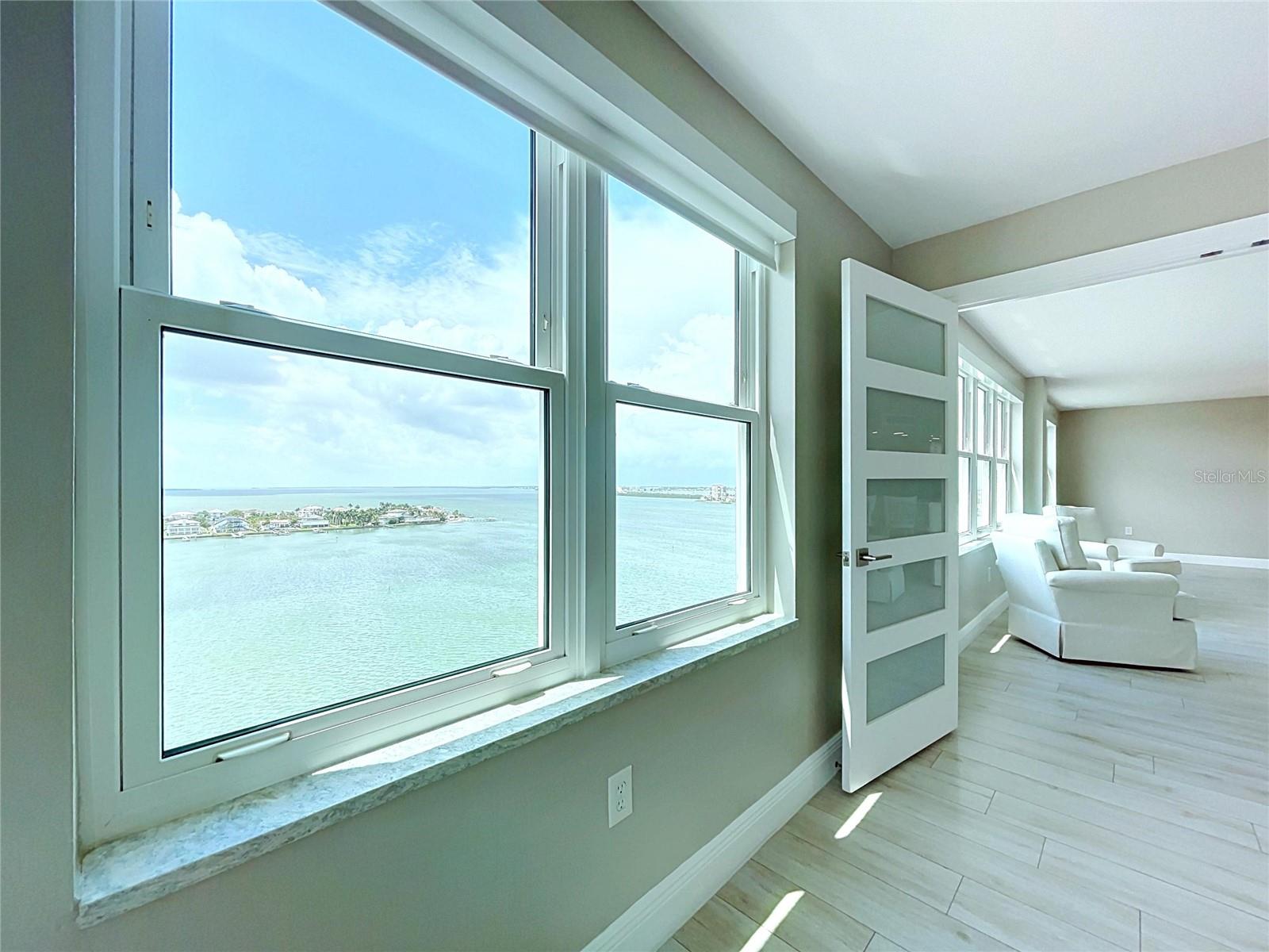Wake up to the sunrise over Tampa Bay from your Primary Suite.