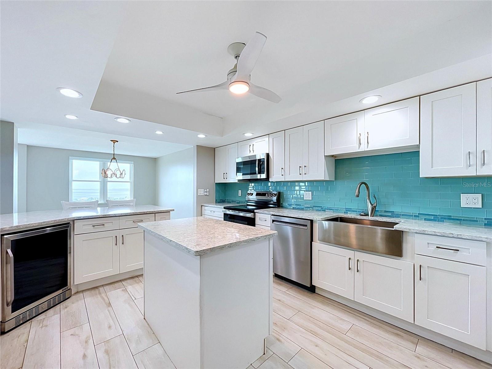 Quartz countertops offer ample prepping and cooking space, built for the chef of the family.