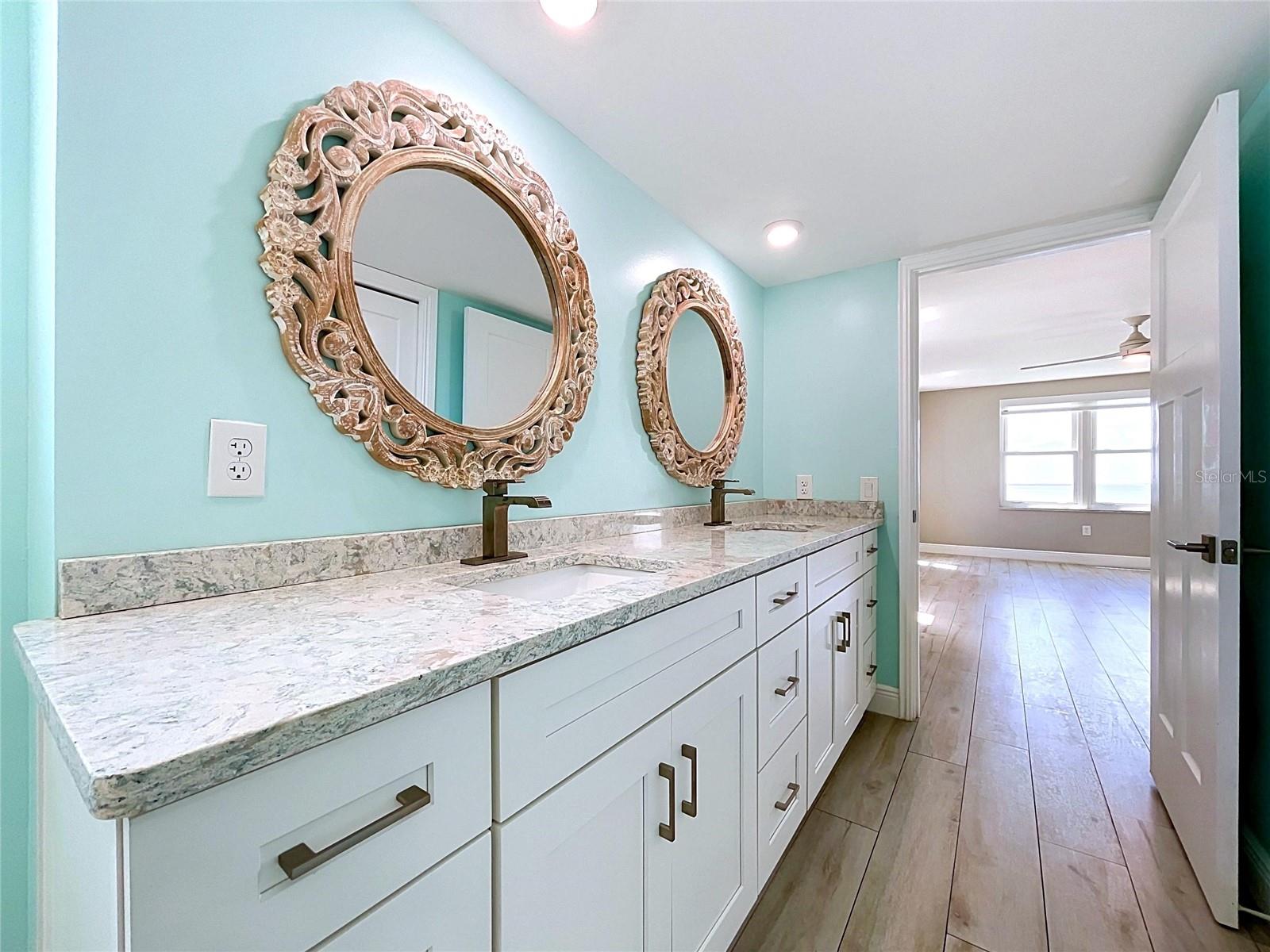 Custom and spetacular Primary bathroom with dual sinks and oversized walk-in shower.