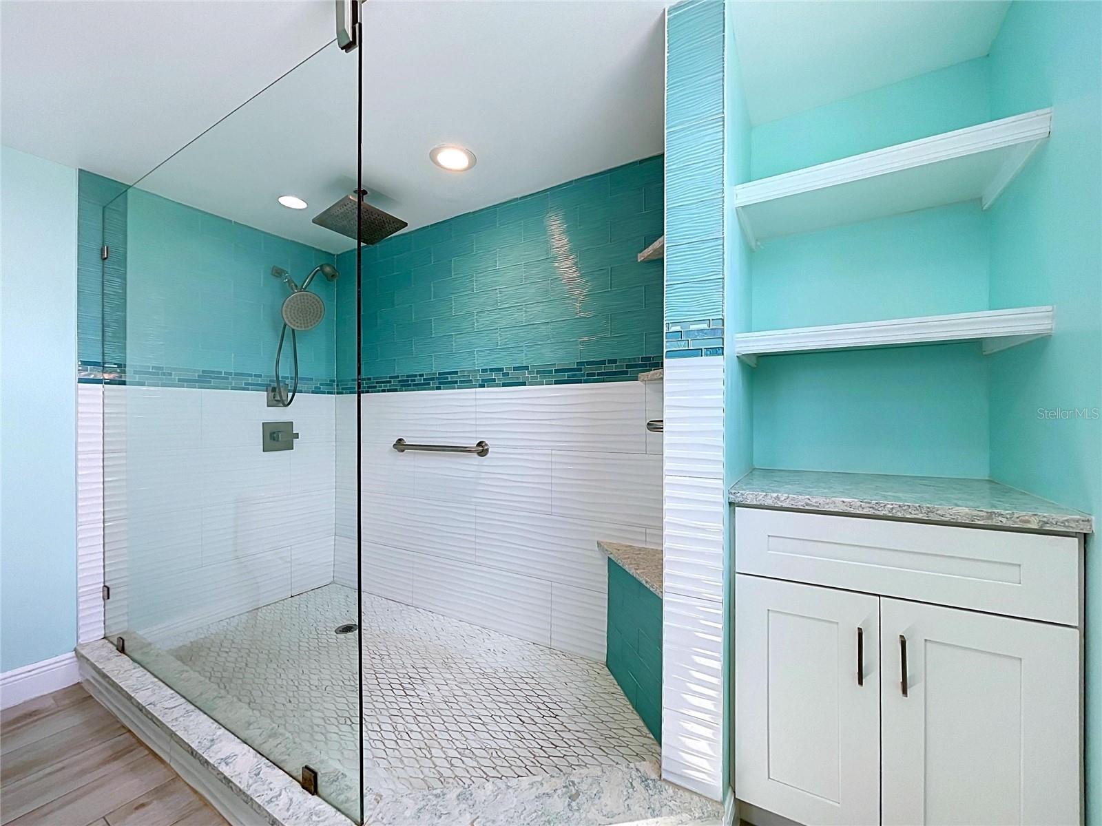 Custom and spetacular Primary bathroom with dual sinks and oversized walk-in shower.
