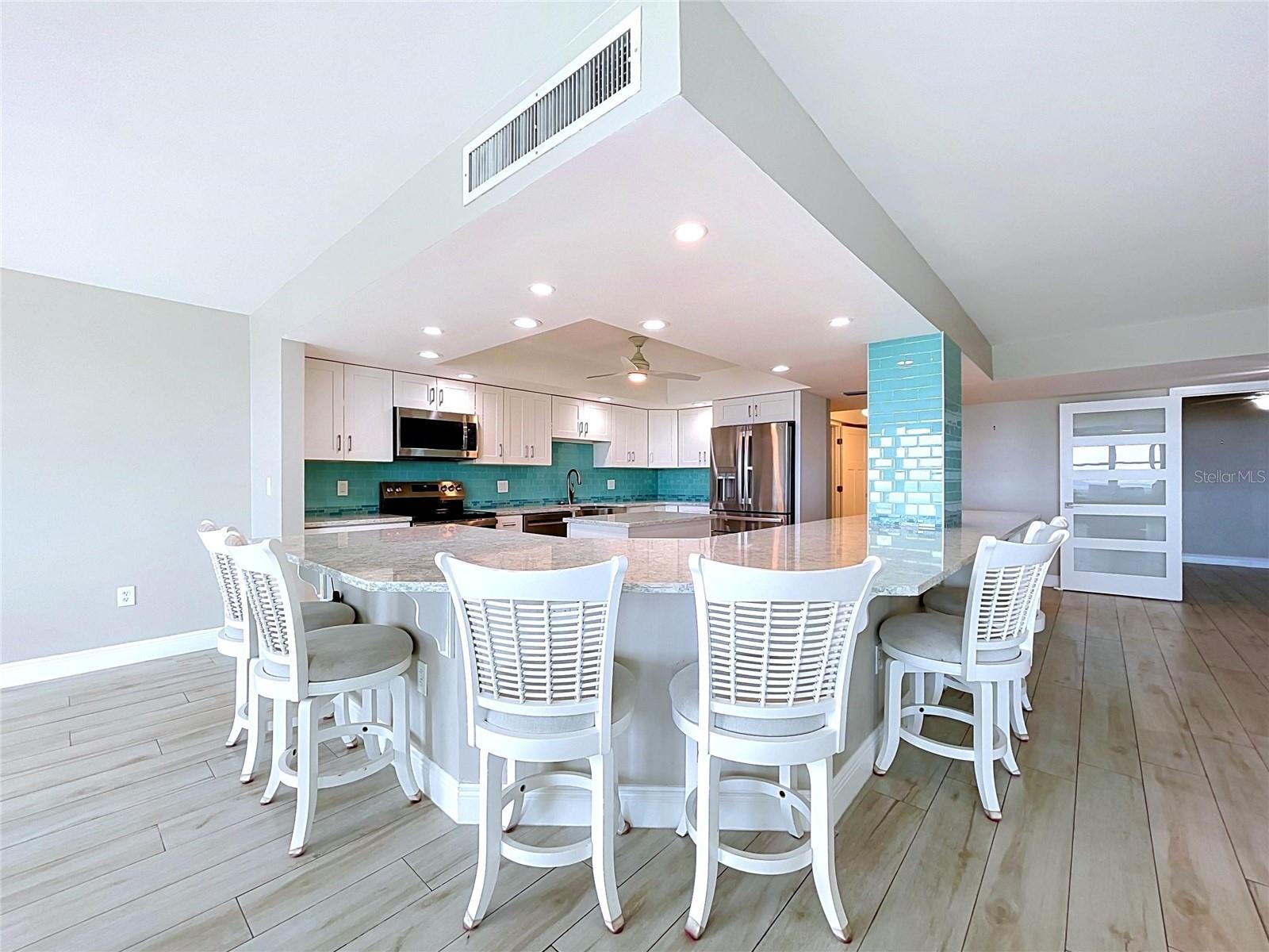 Plenty of space for guest to sit around the kitchen island.