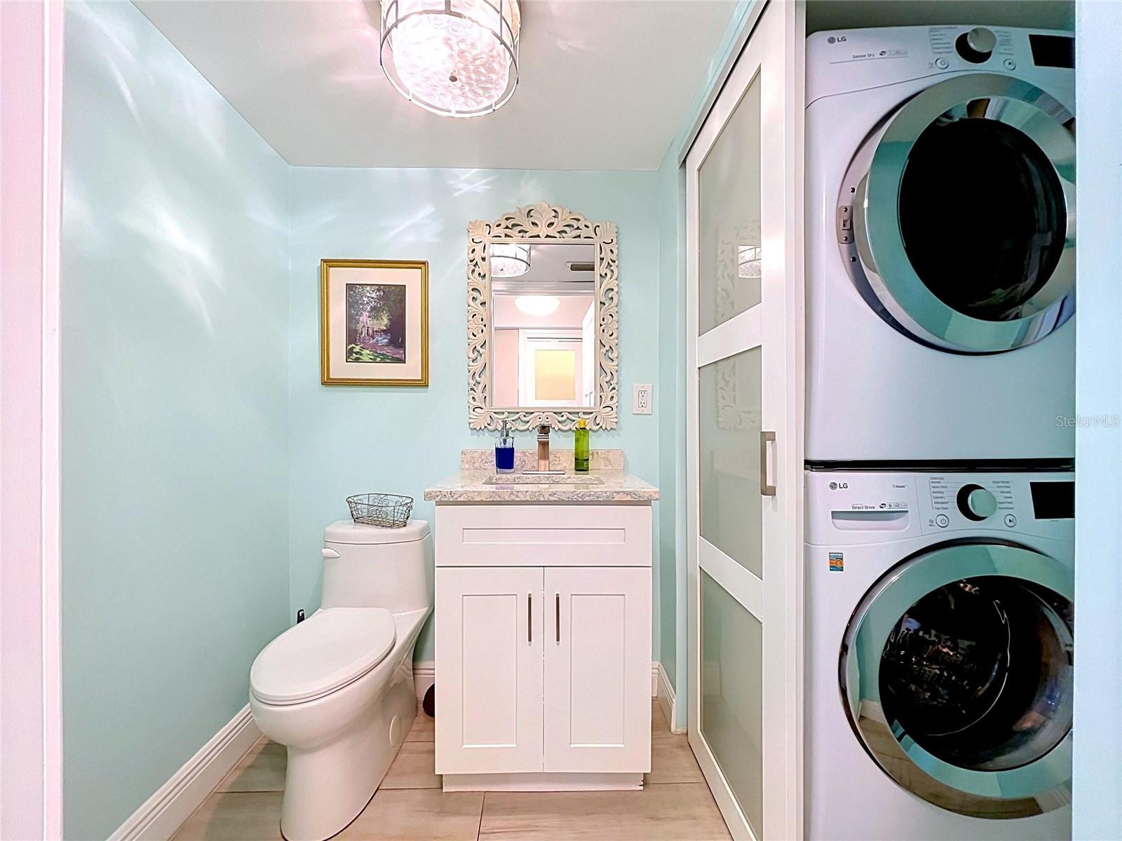The half bath also contains the laundry closet.