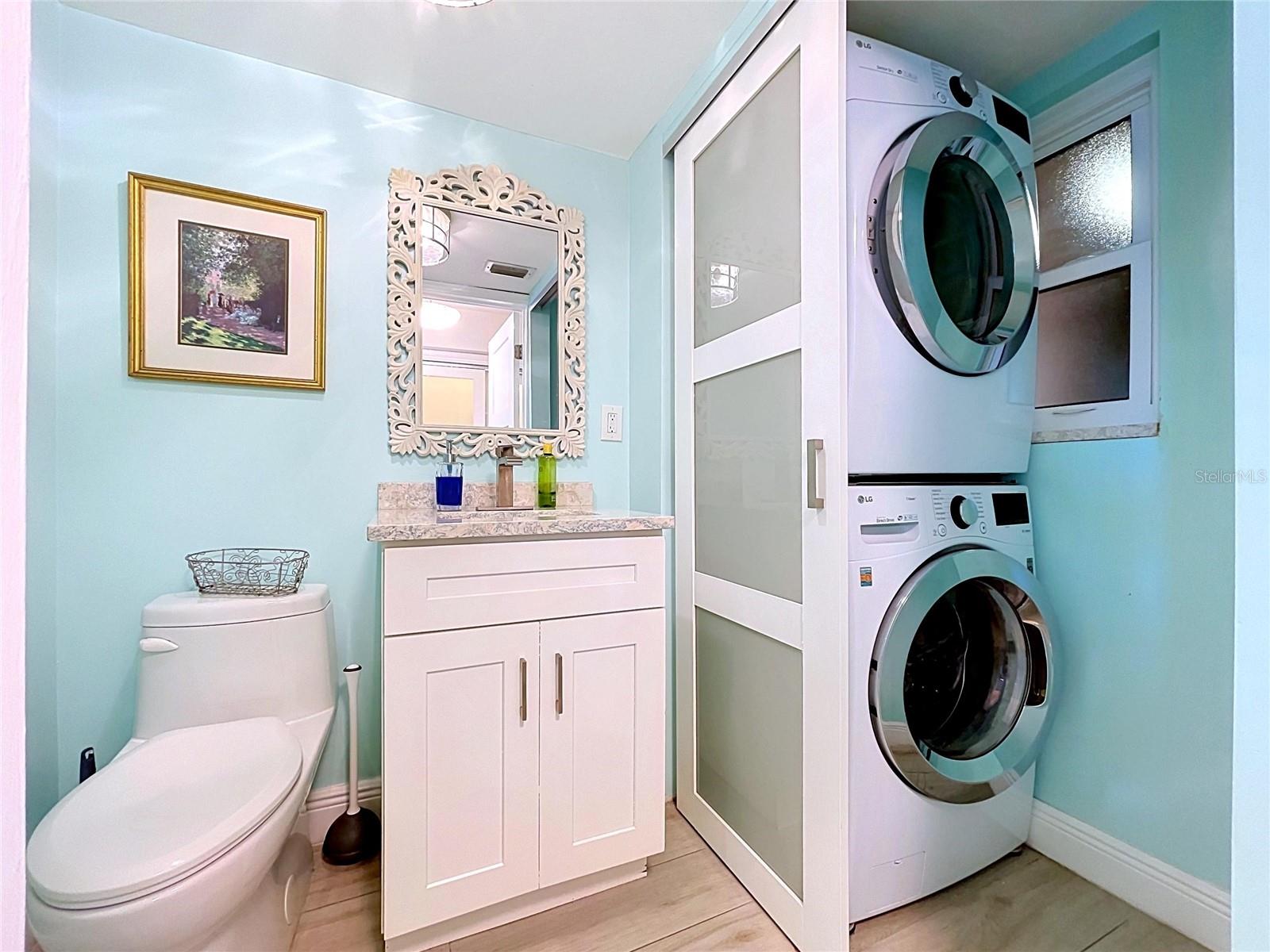 The half bath also contains the laundry closet.