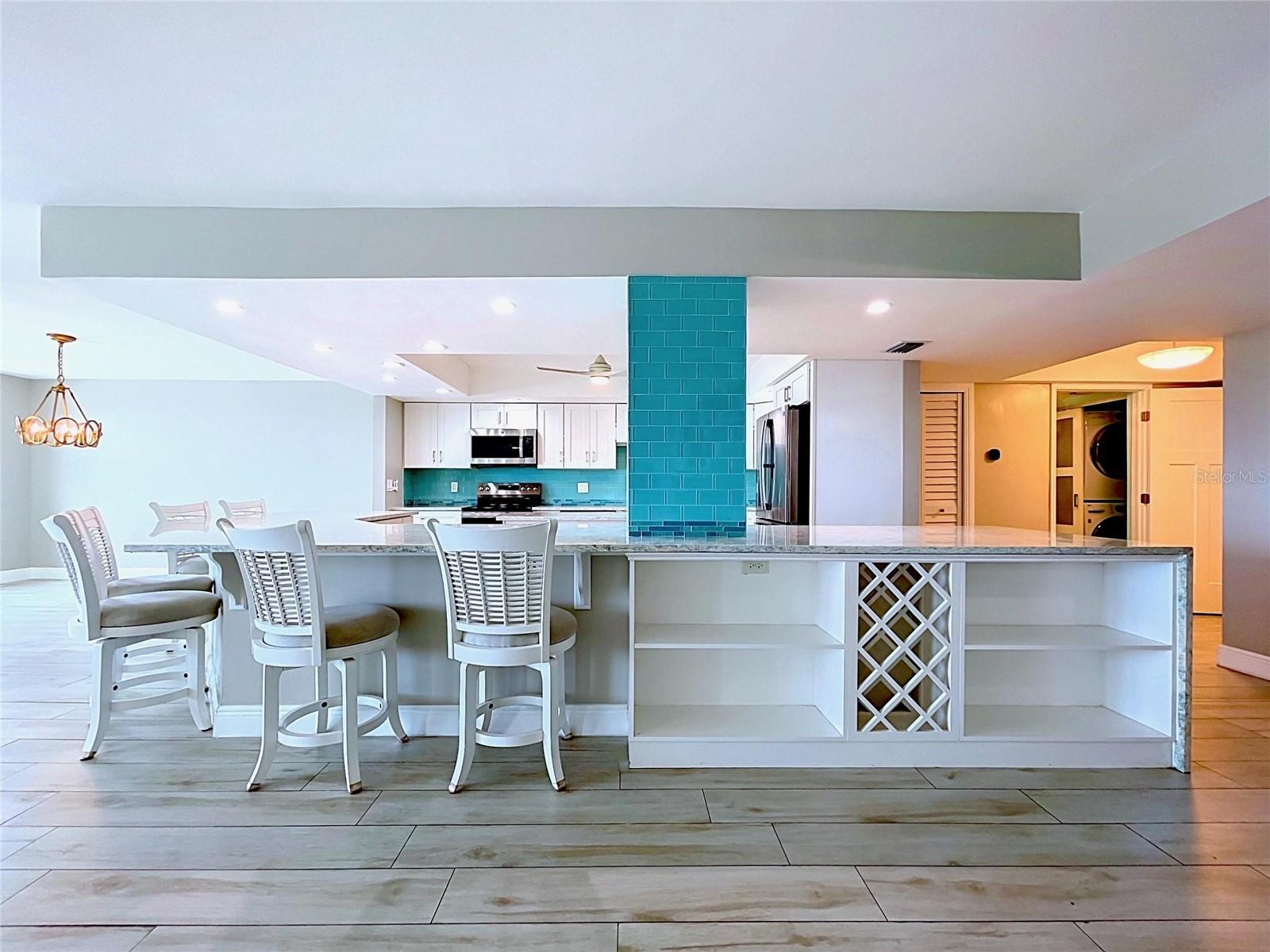 Open view of the kitchen from the living room.
