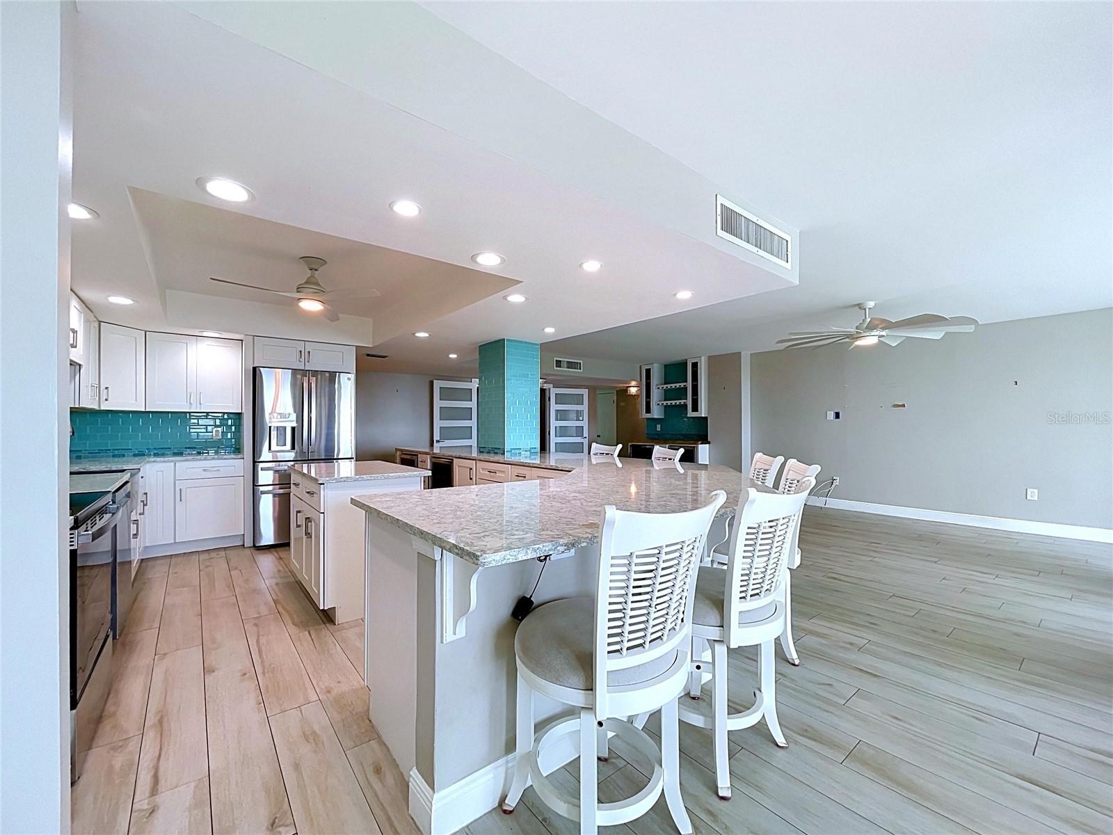 Open view of the kitchen from the living room.