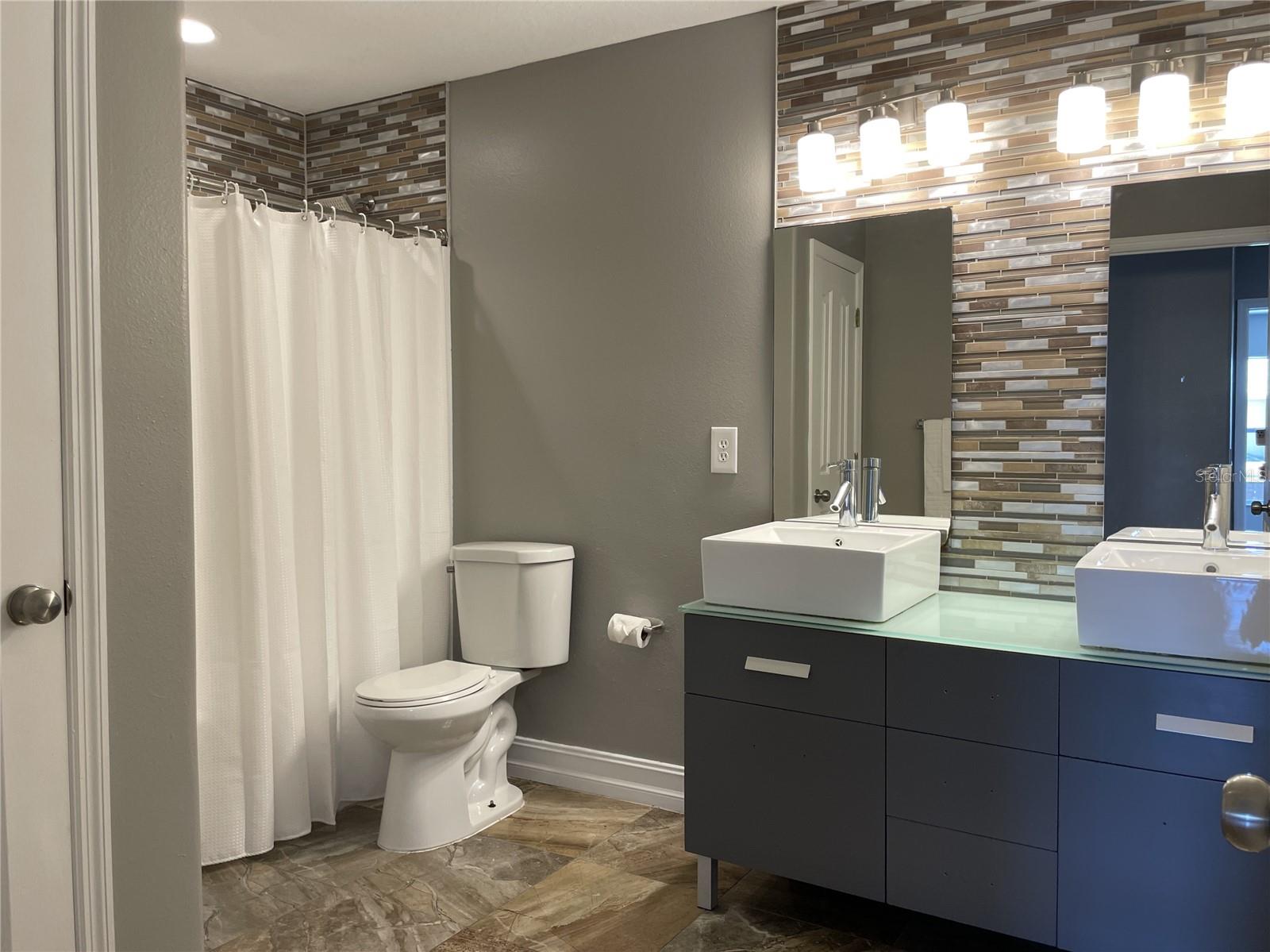 Upstairs Hall Bath with dual sinks