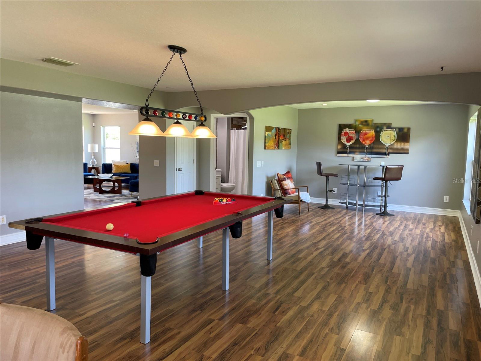 Spacious Family room with additional seating area could be a nice office area