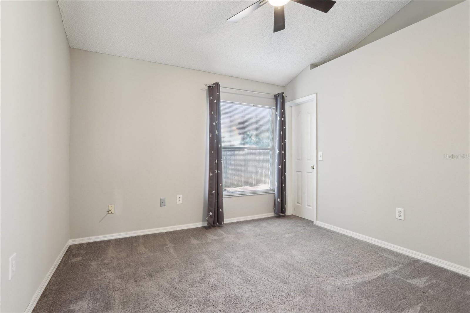 Bedroom 3 has vaulted ceilings and walk in closet