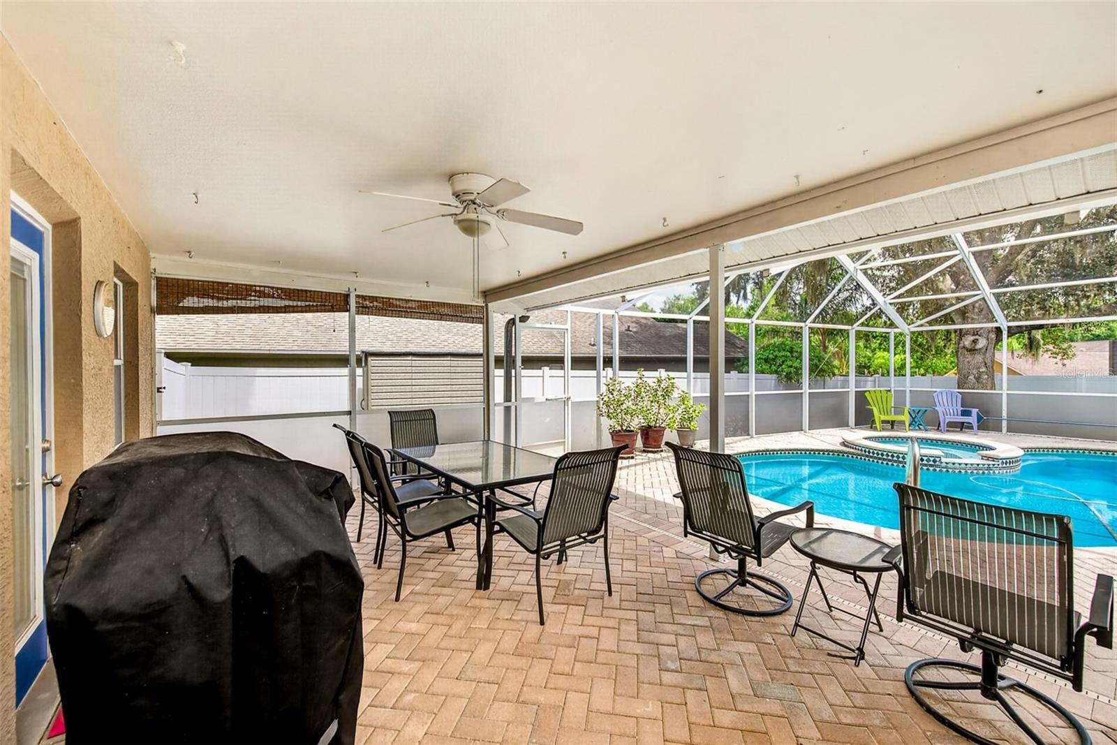 View of patio and inground pool