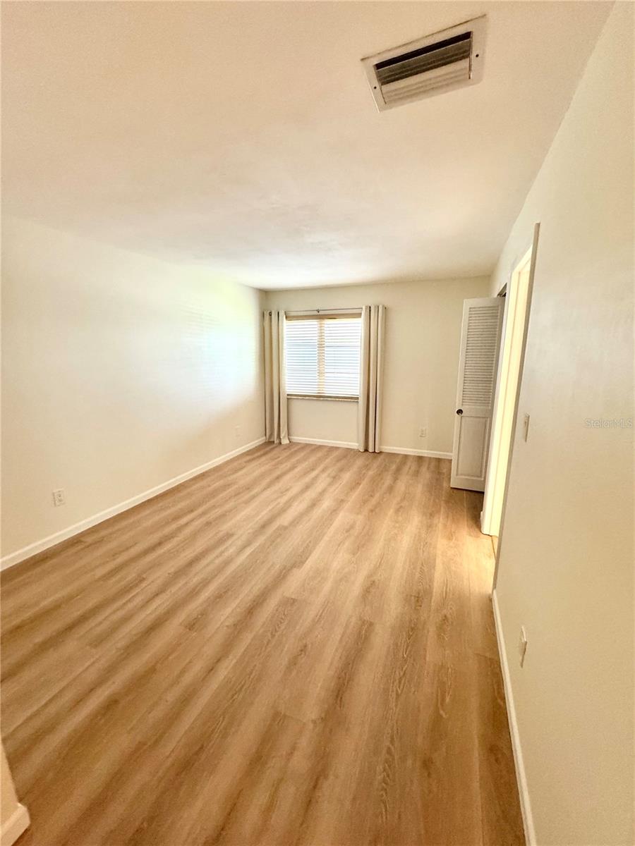 Master Bedroom with Luxury Vinyl flooring