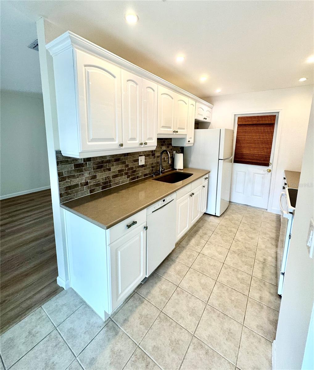 Updated Kitchen leads to Garage
