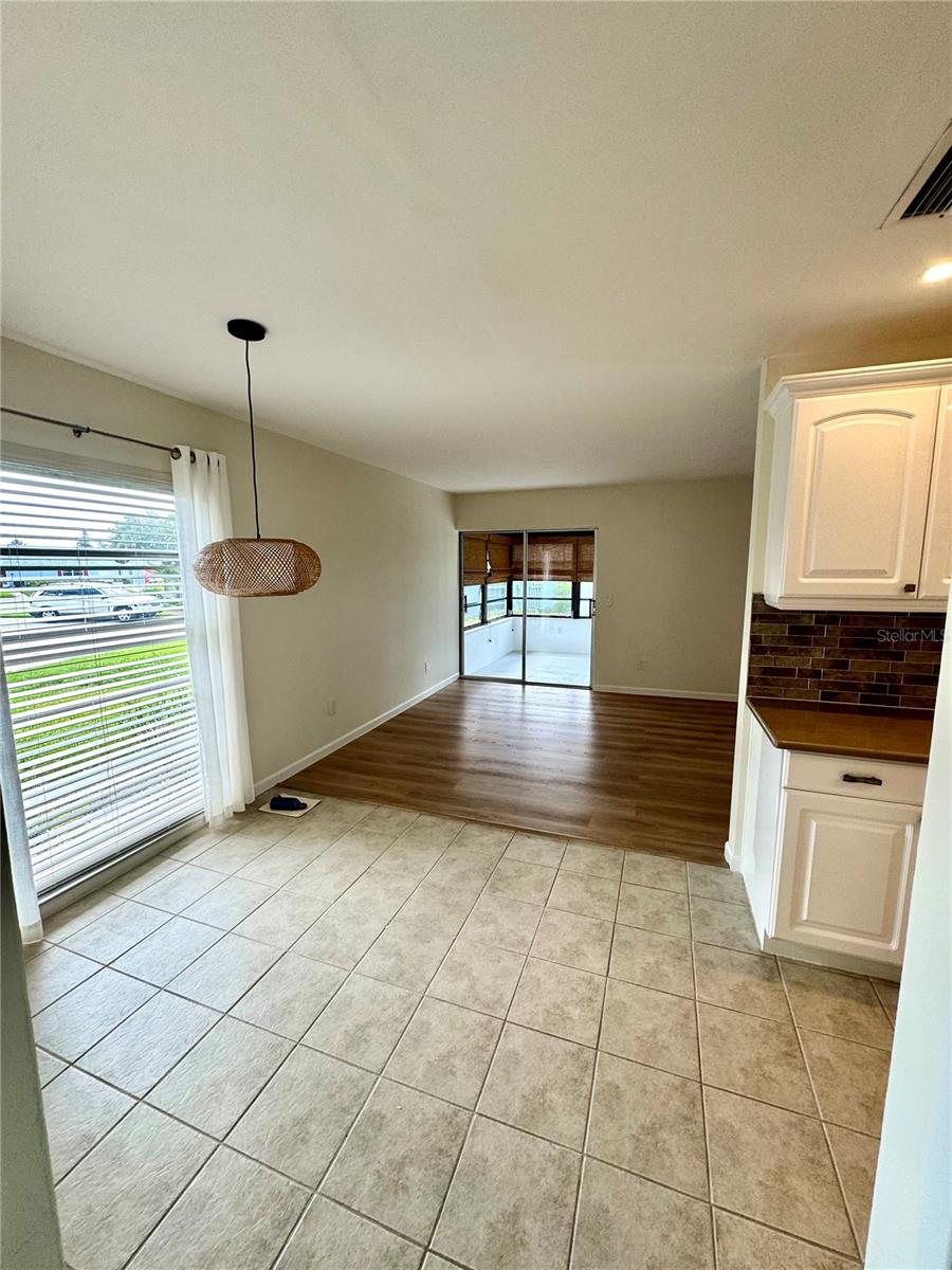 Dining area leading to living and enclosed patio