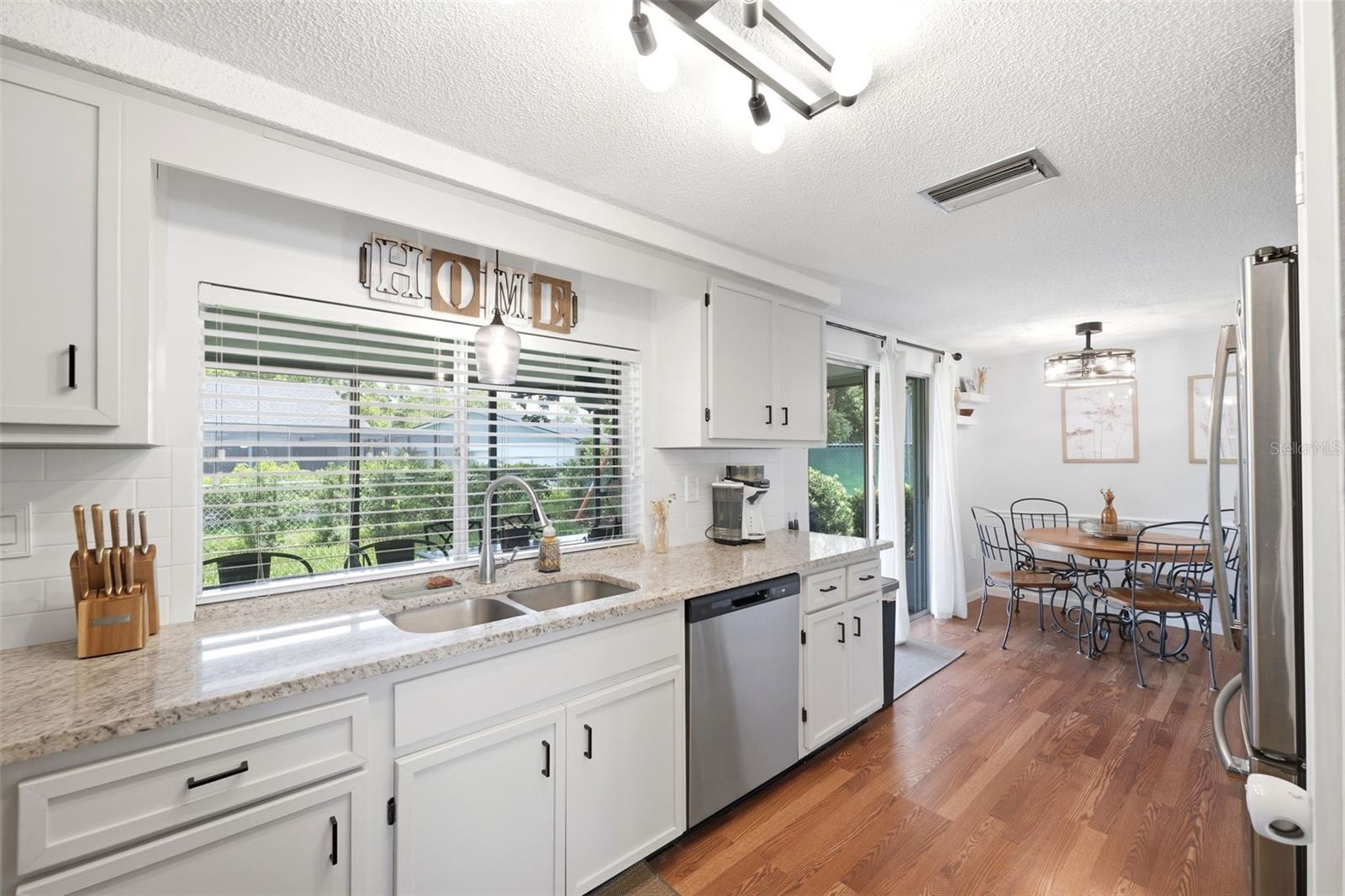 updated kitchen with new lighting fixtures