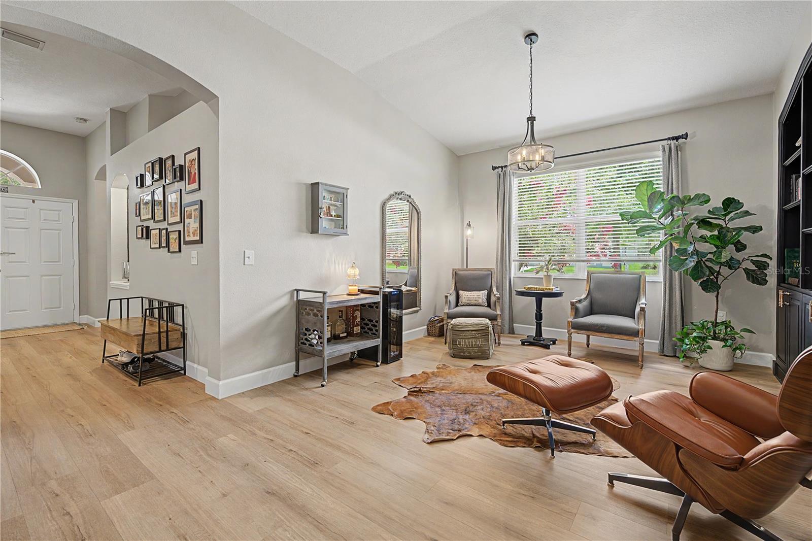 Arched Foyer & vaulted Flex Space