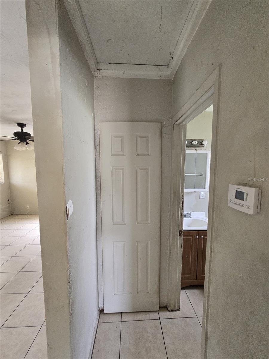Hallway and entrance between living room and bathroom