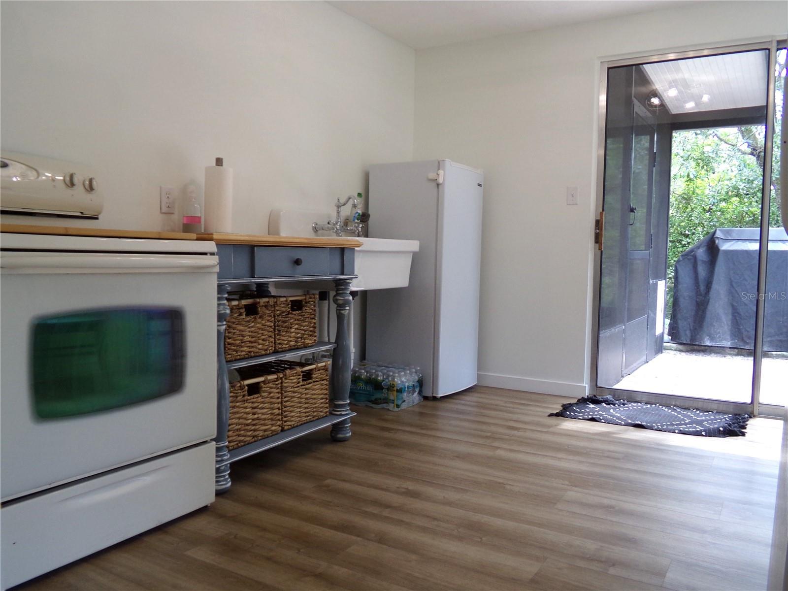First Floor Kitchenett with Sliding Doors to Patio Area