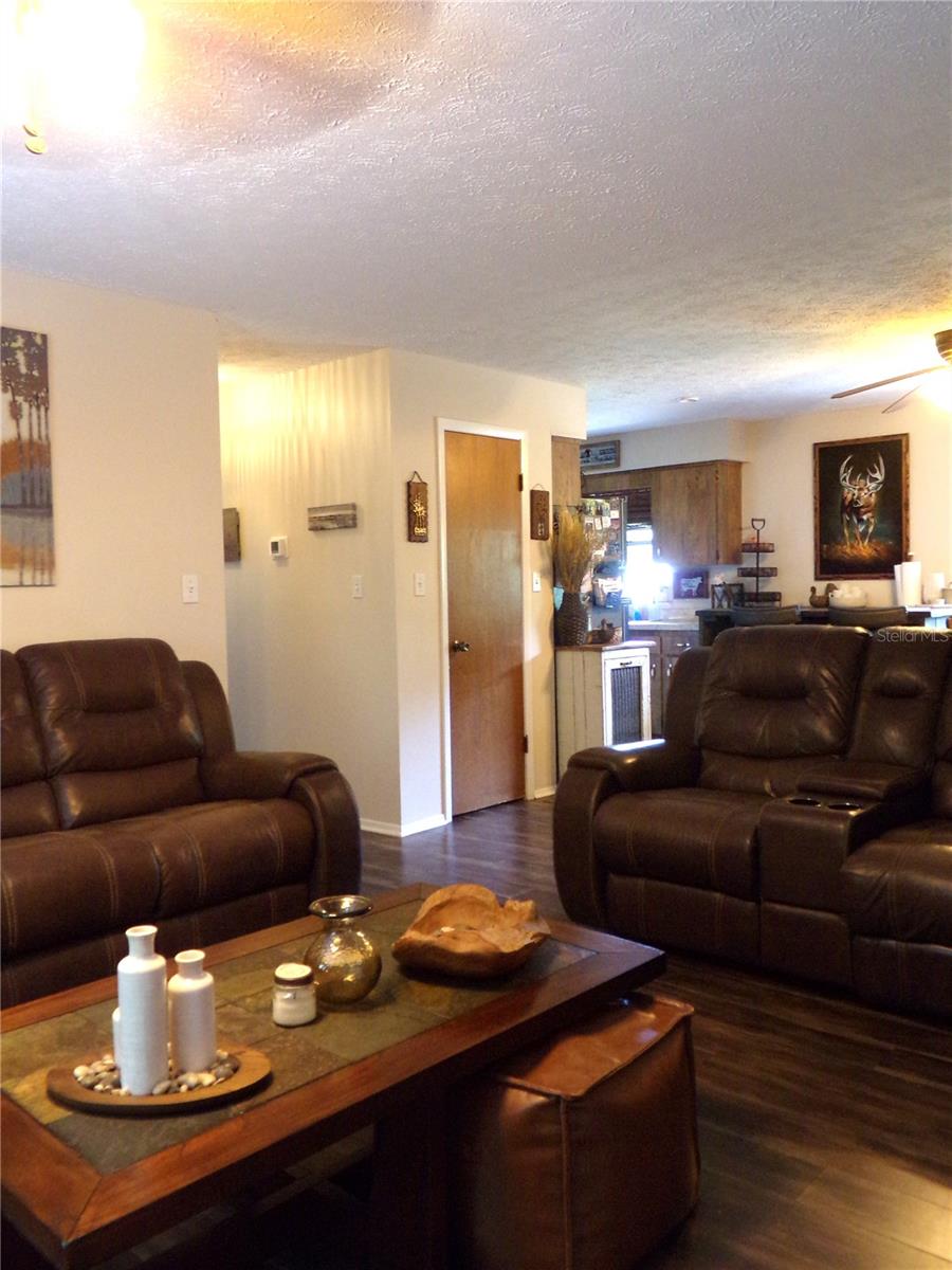 Second Floor View from Livingroom into Dining and Kitchen