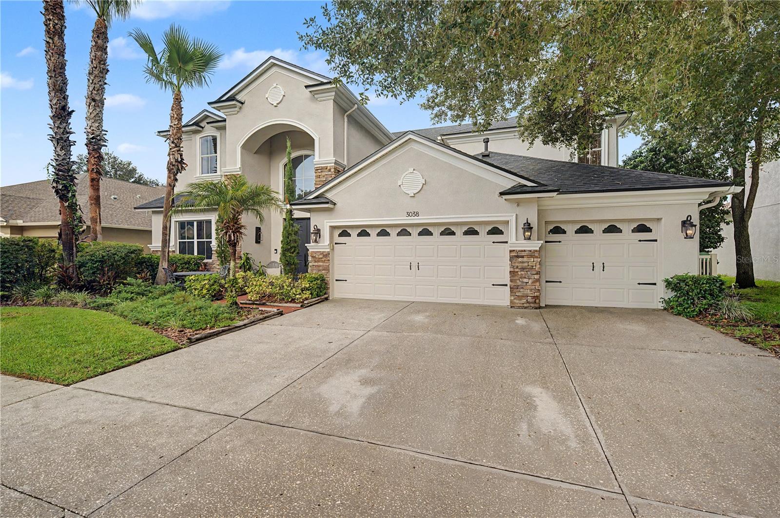 Full 3 car garage with plenty of parking