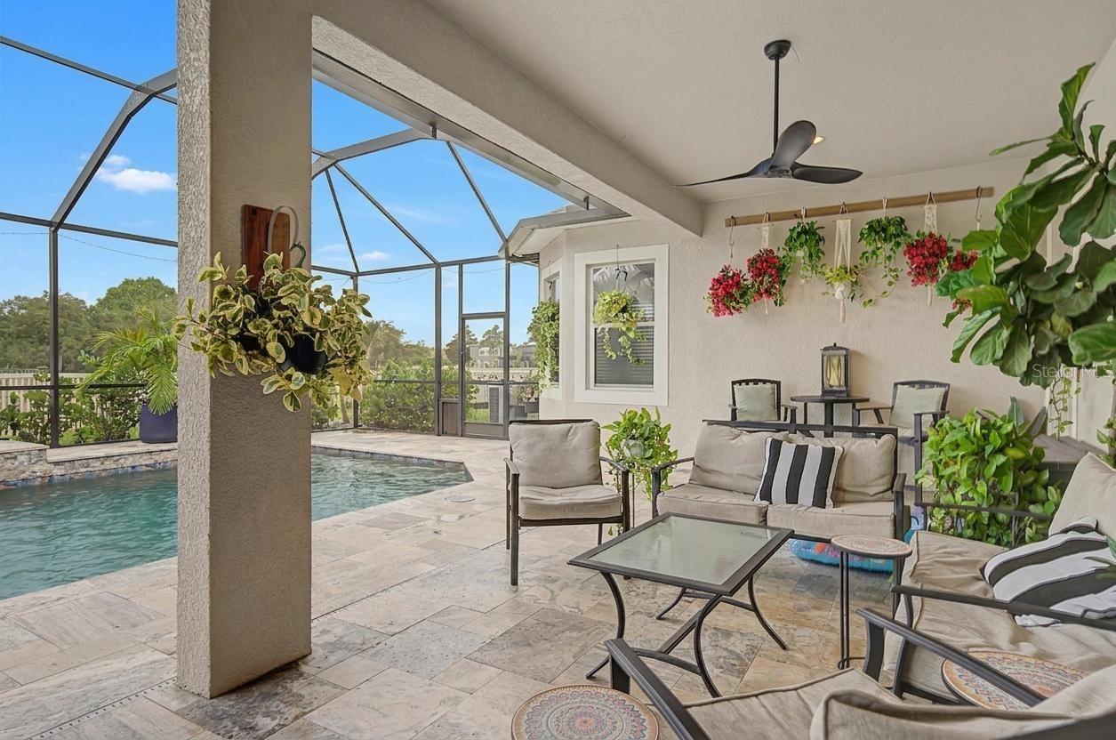 Covered outdoor area overlooking spectacular pool!