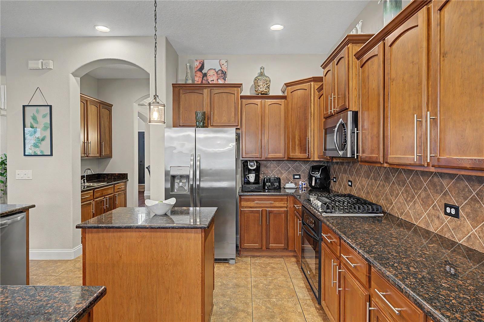 Generous wood cabinets with crown