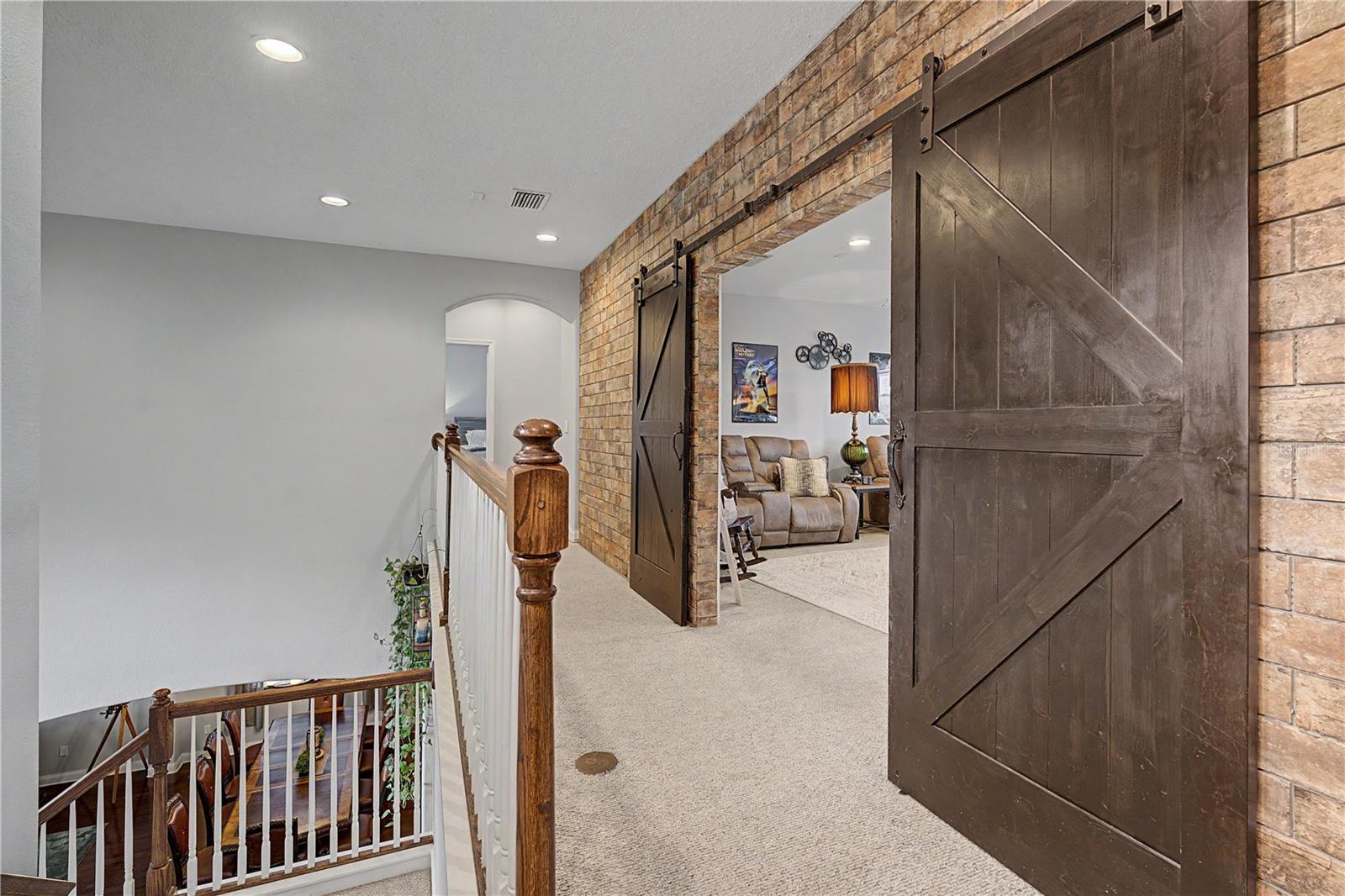 Striking Barn doors open to game room