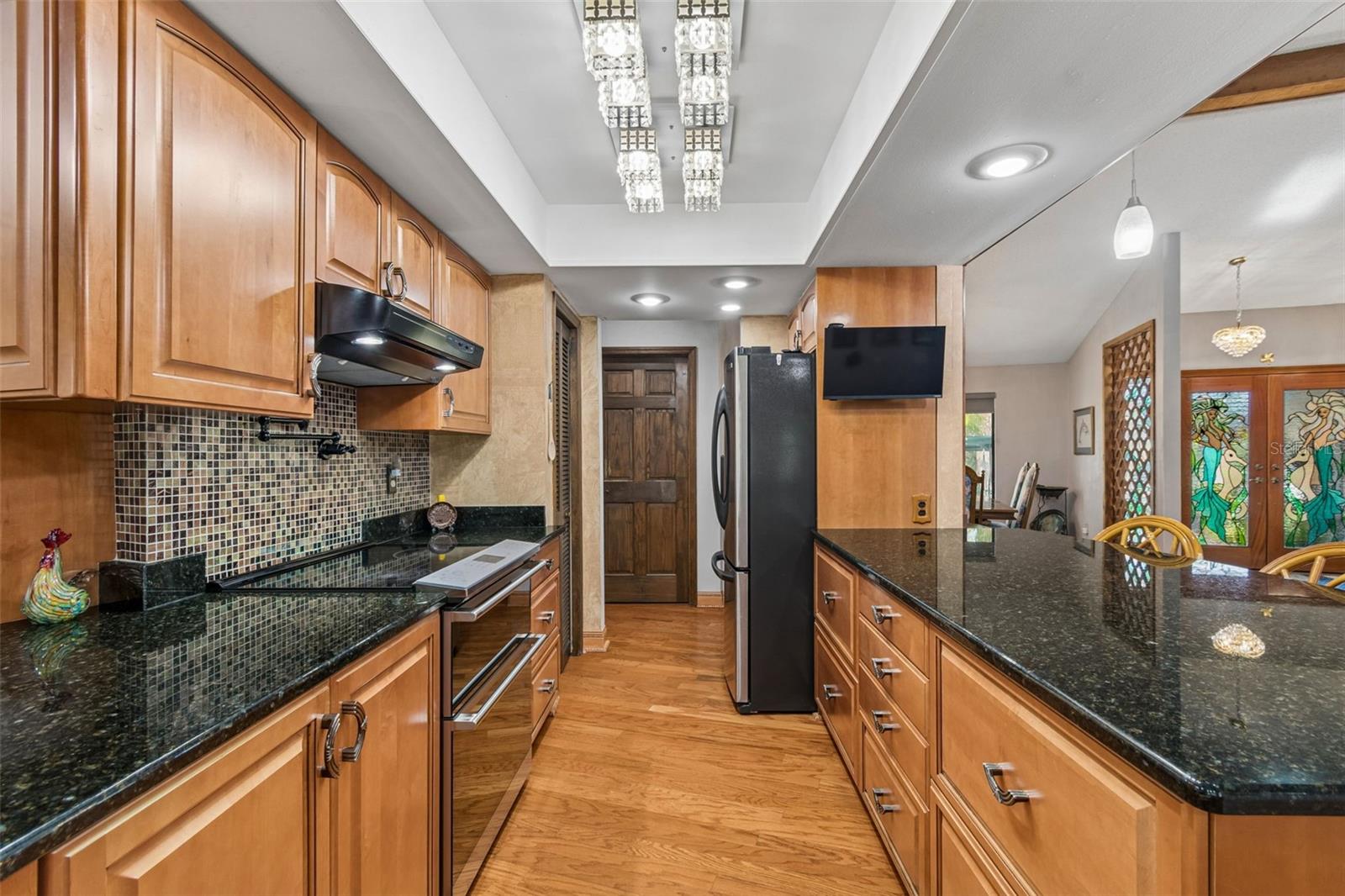 Prep space galore with gleaming floors and countertops