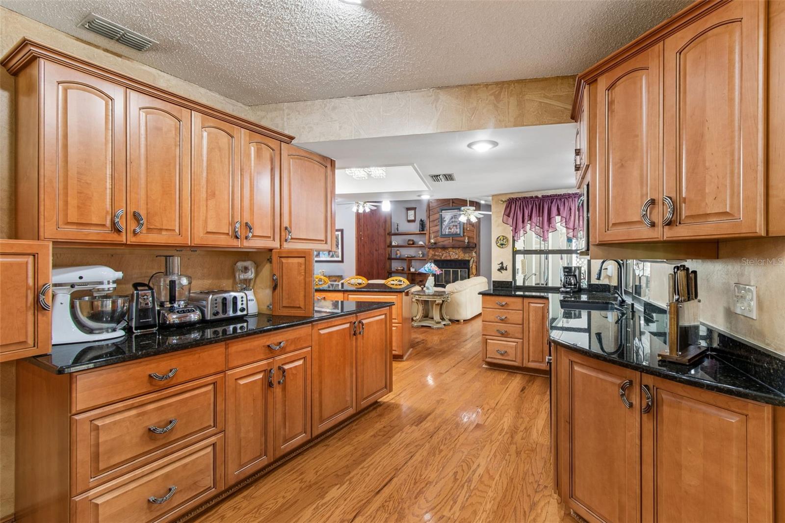 Hardwood floors throughout main home add a luxurious feel