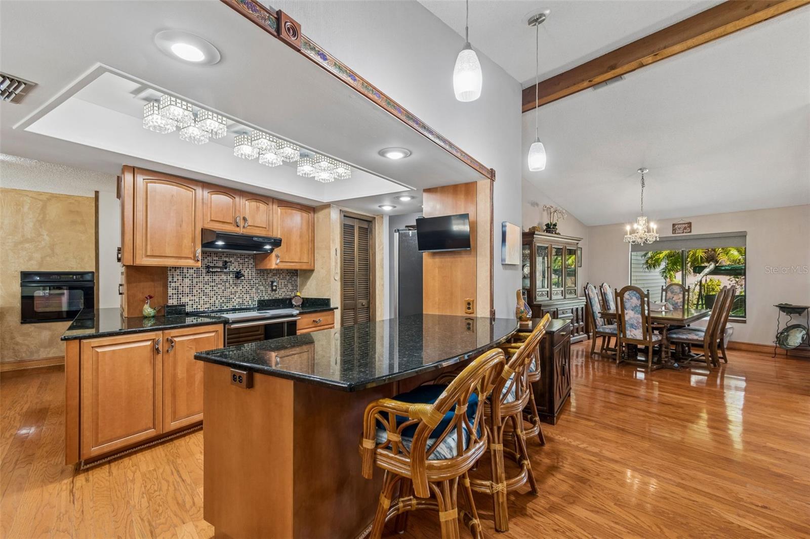 Open flow to the formal dining room makes entertaining a breeze