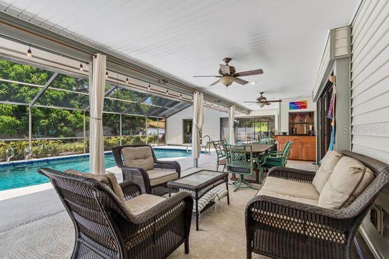 Covered lanai with large entertaining space