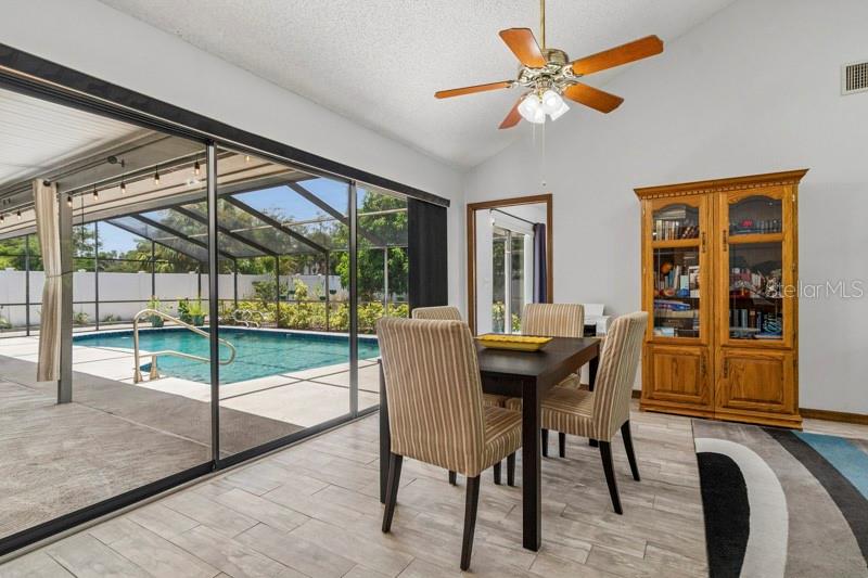 Spacious family room with another private pool entrance for endless entertaining options!