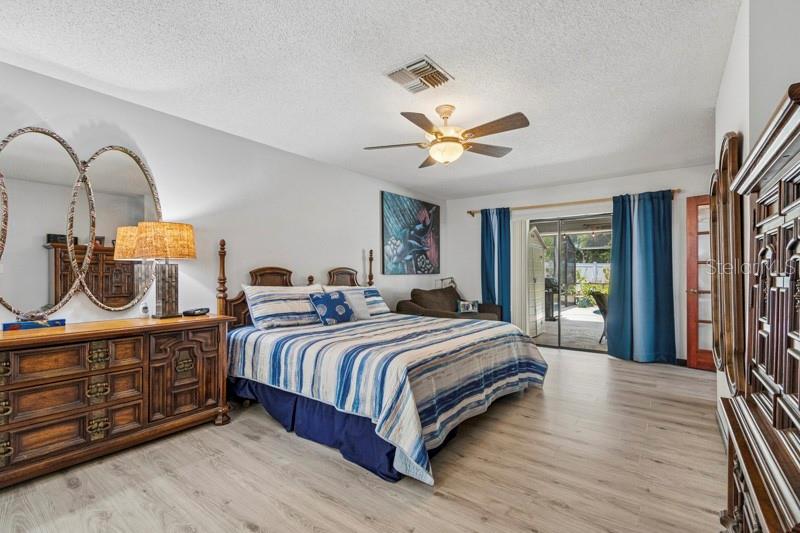 Spacious Primary Suite 1 with private pool access