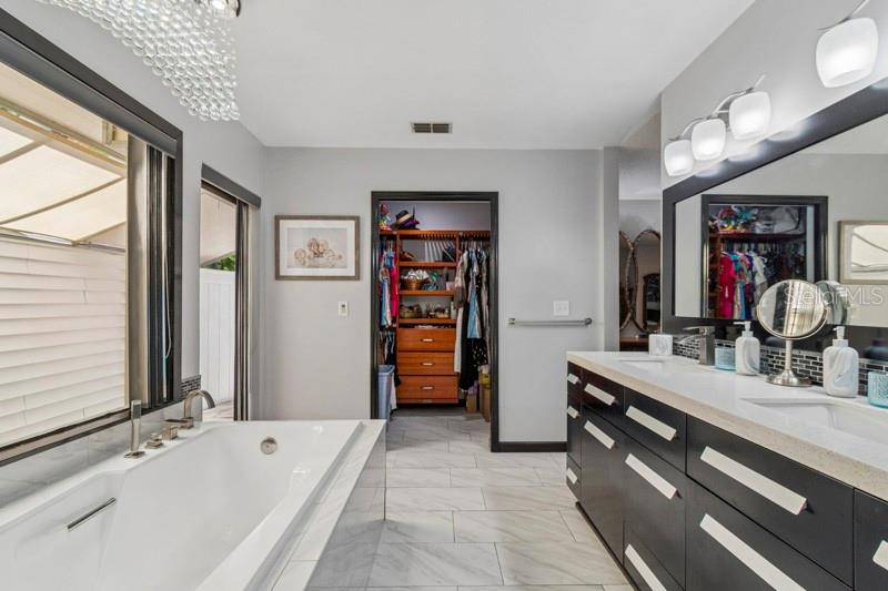 Primary Suite 1 with spacious 2nd closet and natural light