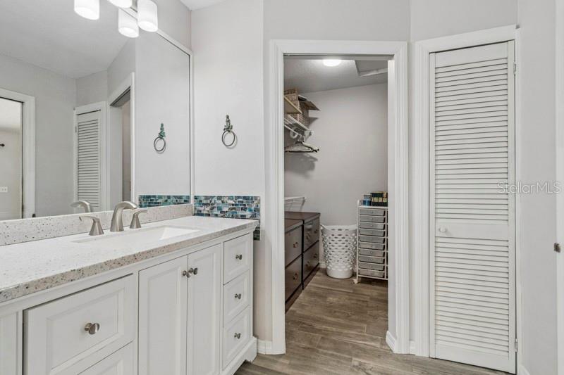 Primary Ensuite 2 with a dedicated linen closet and walk-in closet