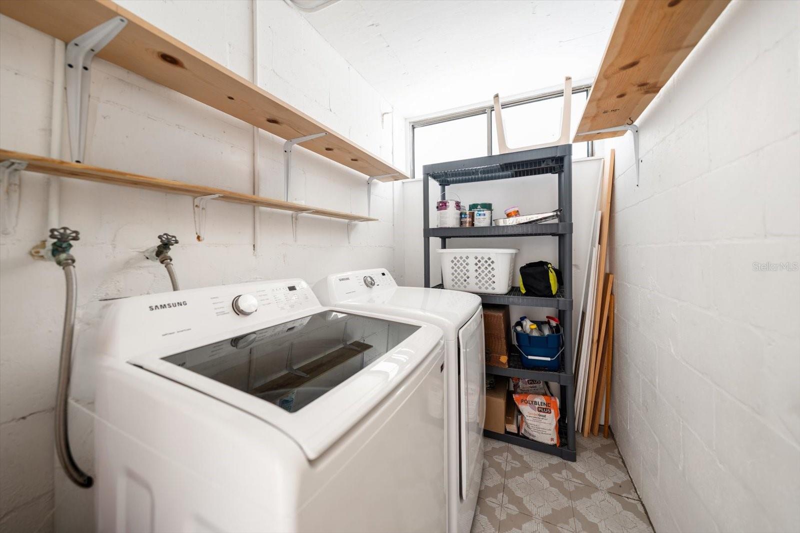 private laundry room and storage