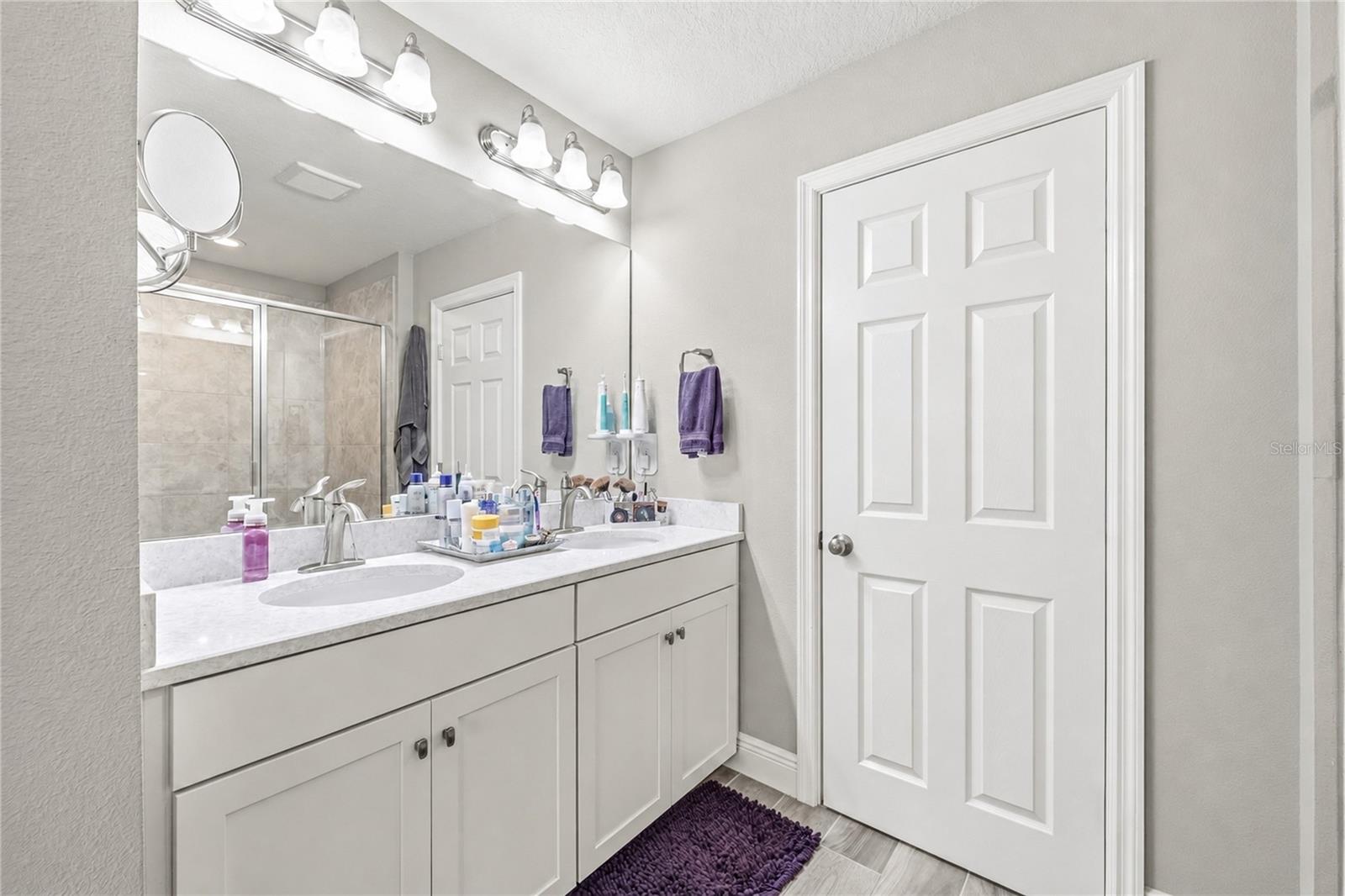 En Suite Bathroom with large walk in closet!