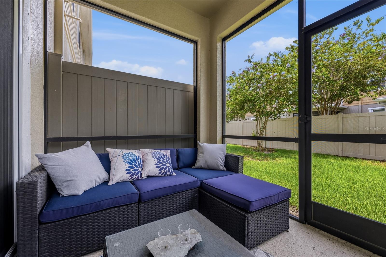 Lanai is screened and has fence for privacy