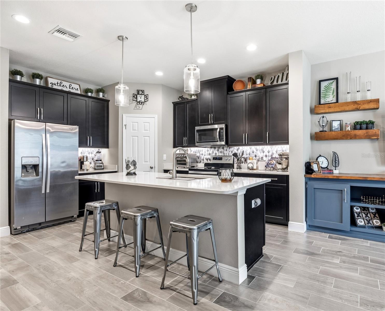 Kitchen with Island and Solid Surface counters!