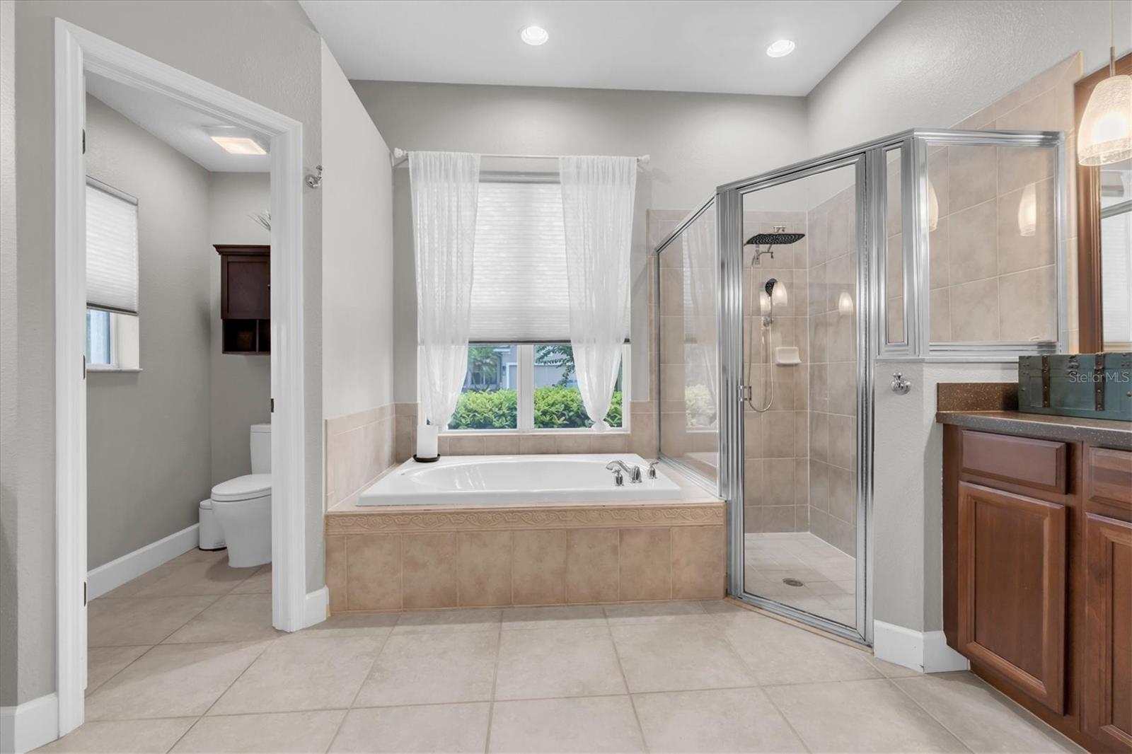 owners en suite with dual cabinets/sinks