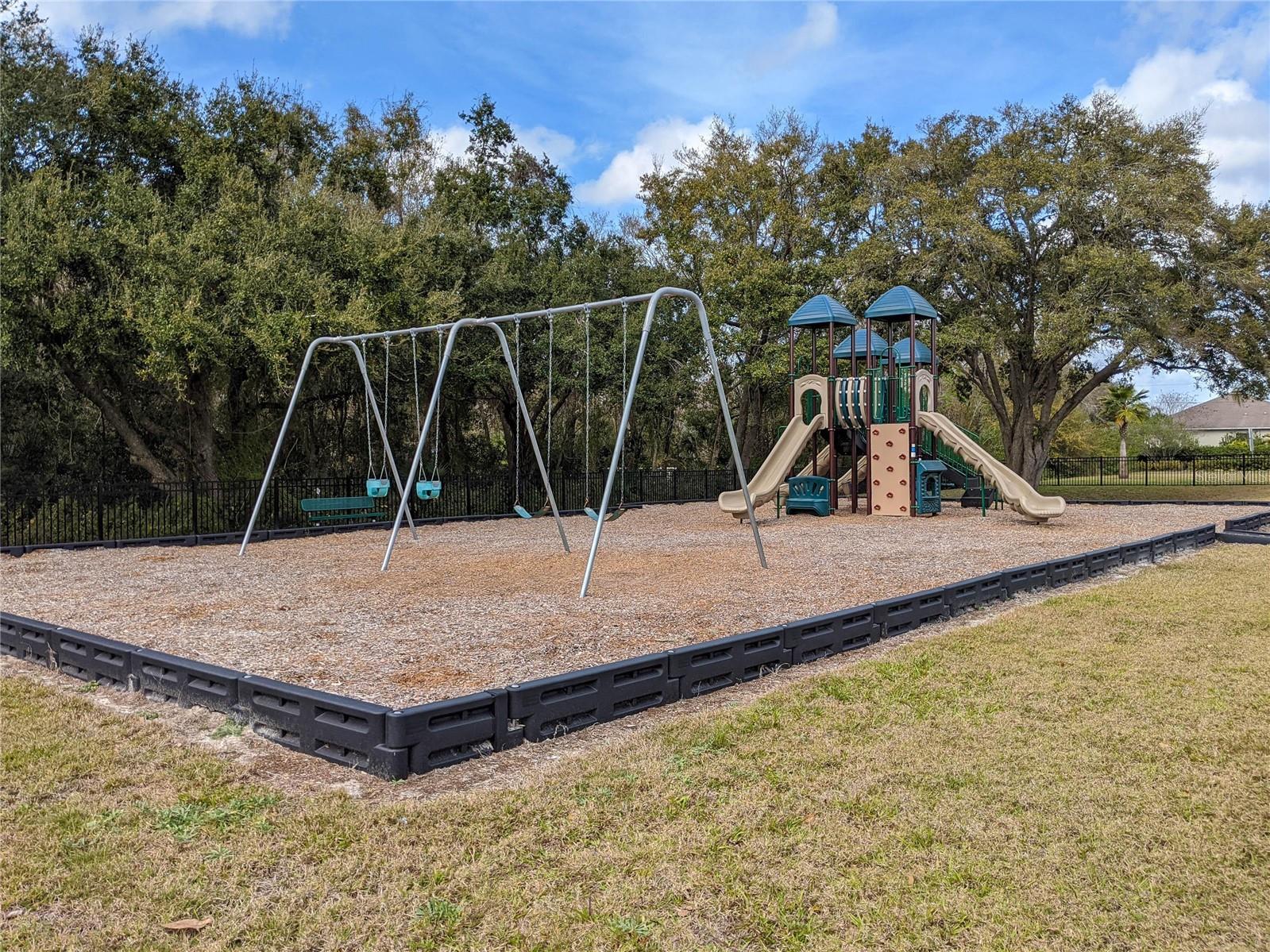 spacious fenced playground
