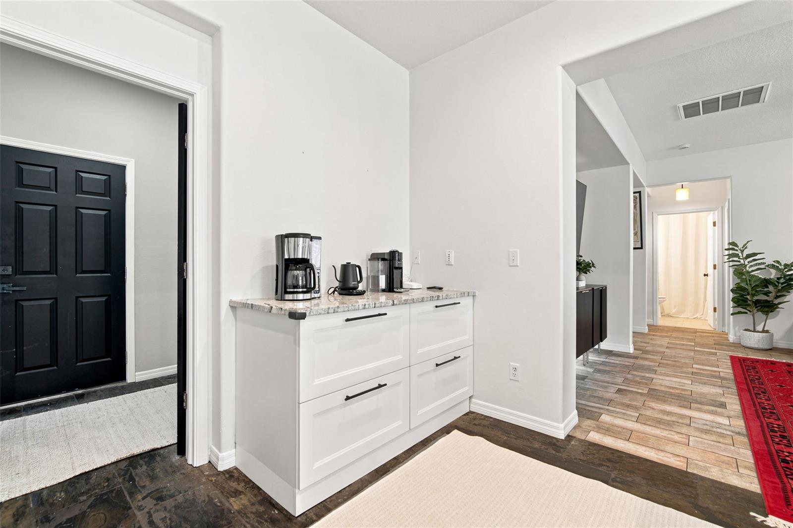 Garage entrance and Laundry Room