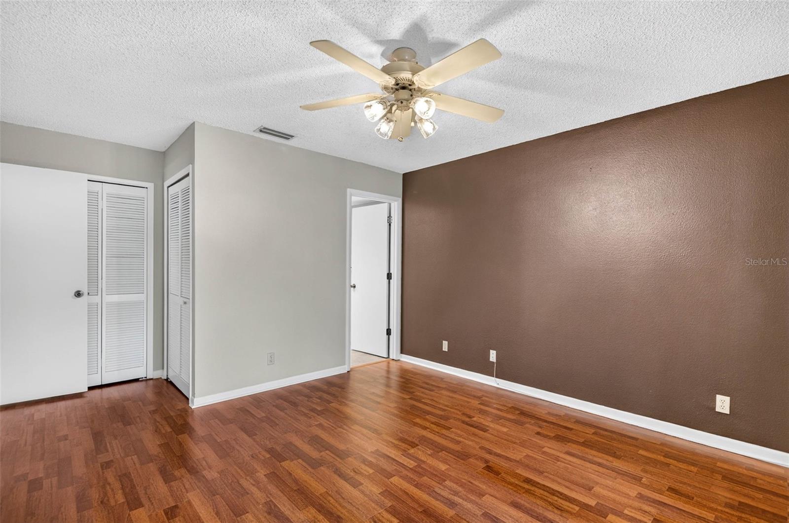 Primary with walk in closet.
