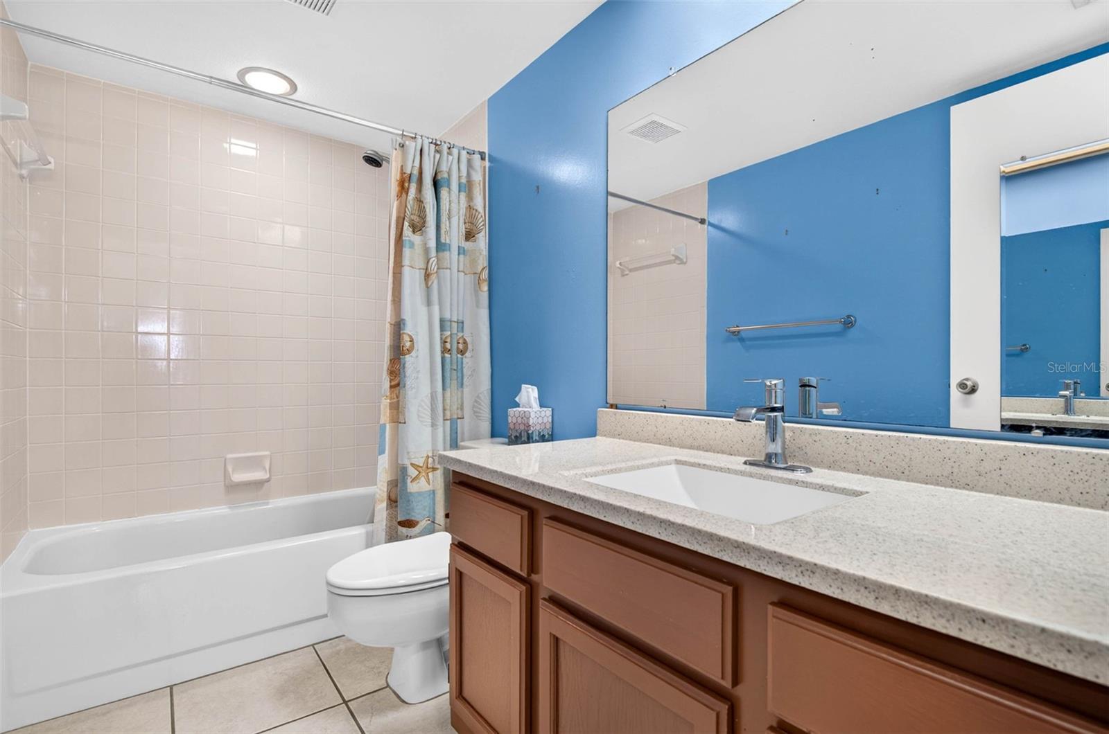 2nd bathroom with tub and shower