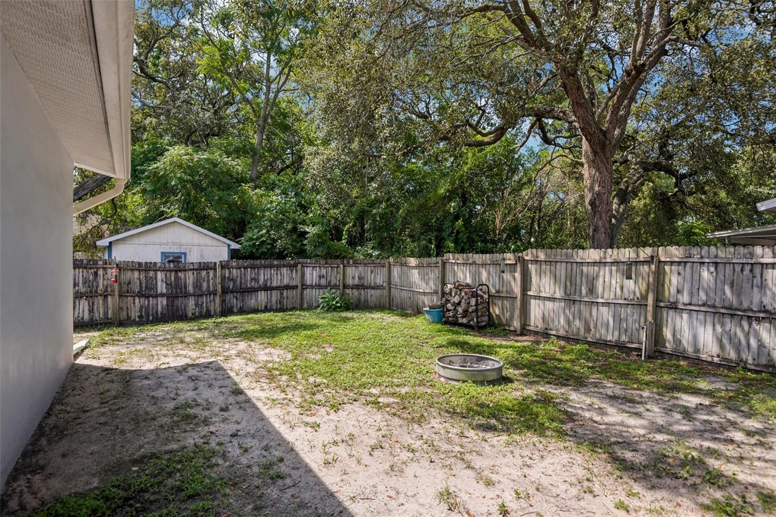 Side/rear yard with fire pit