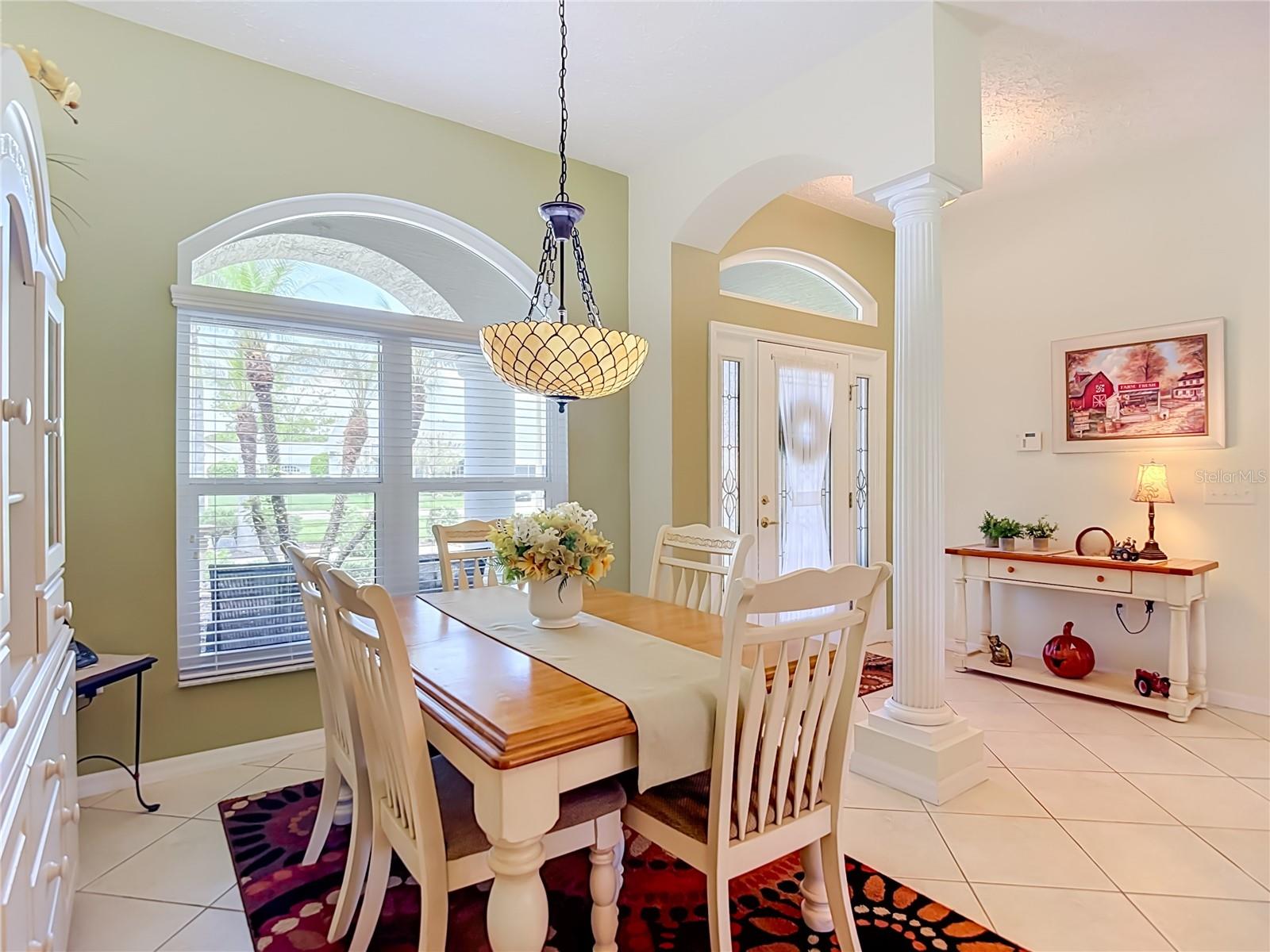 Dining area and a great view of the newly installed windows within the home.