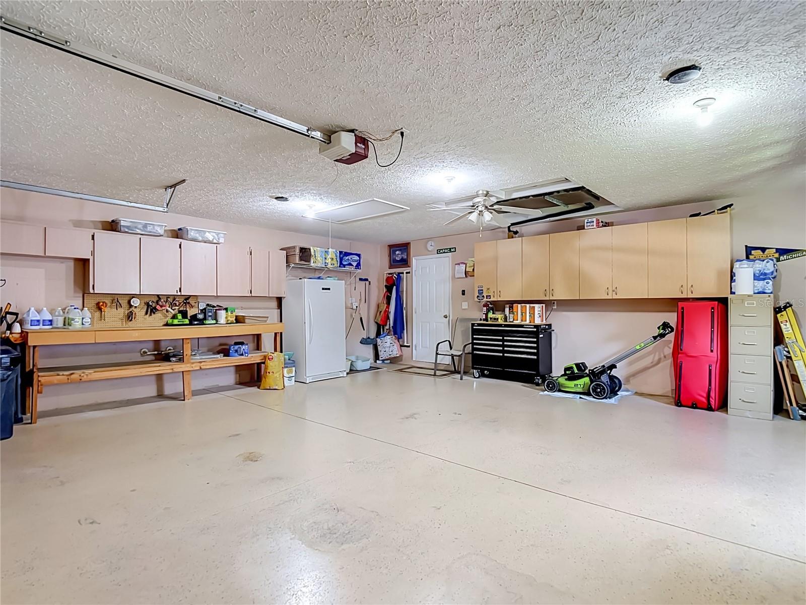 The roomiest garage with 675 sq.ft.  Over sized parking pad.