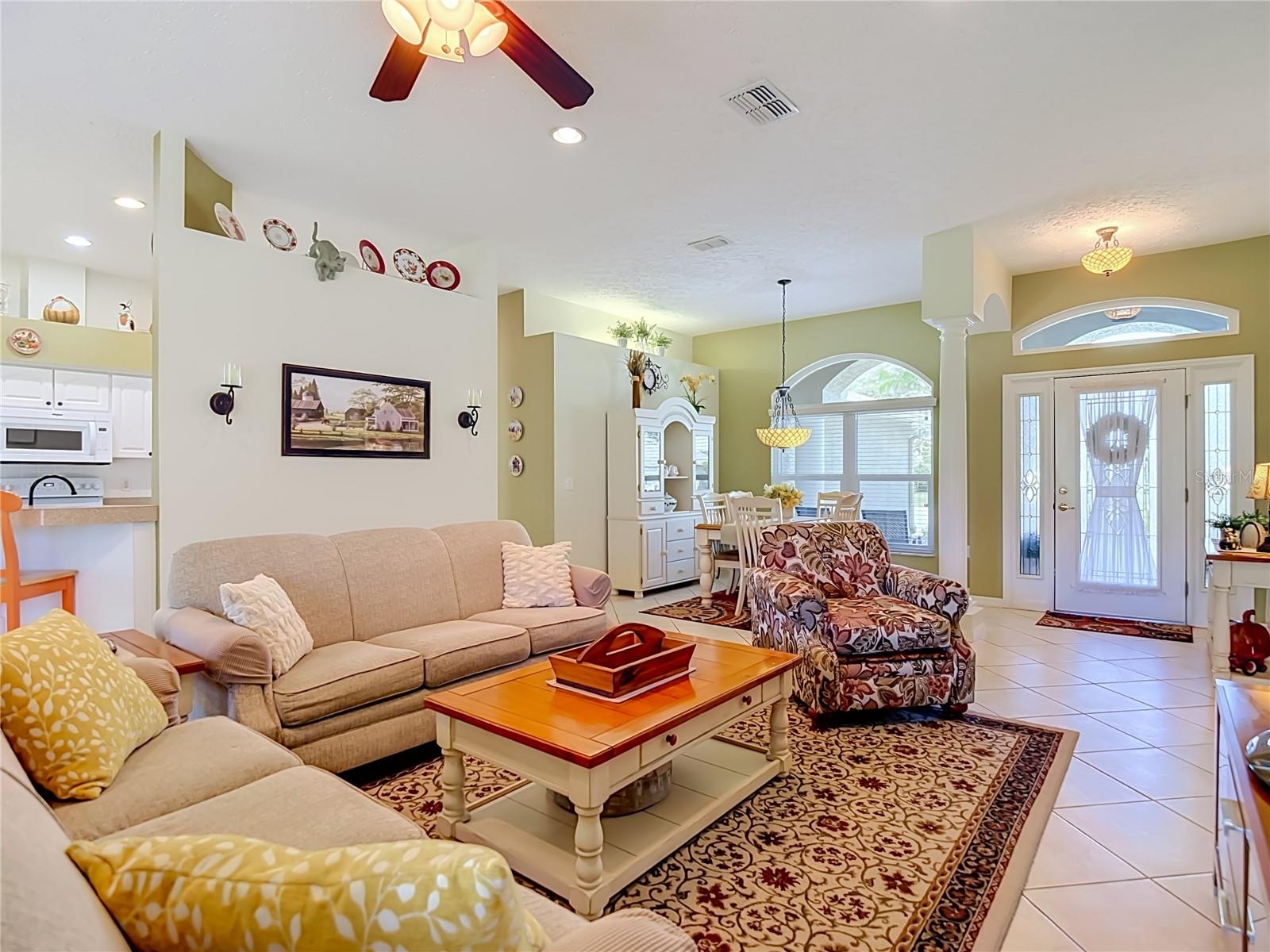 View of living and dining room.  This home comes furnished.