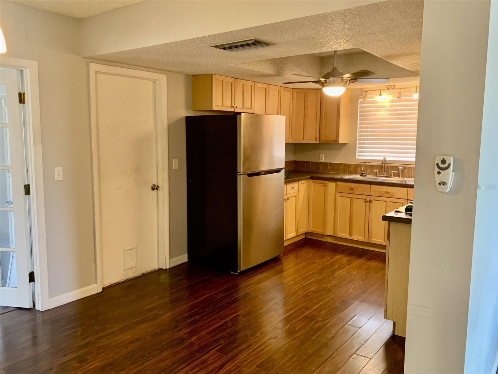 View of kitchen from dining room