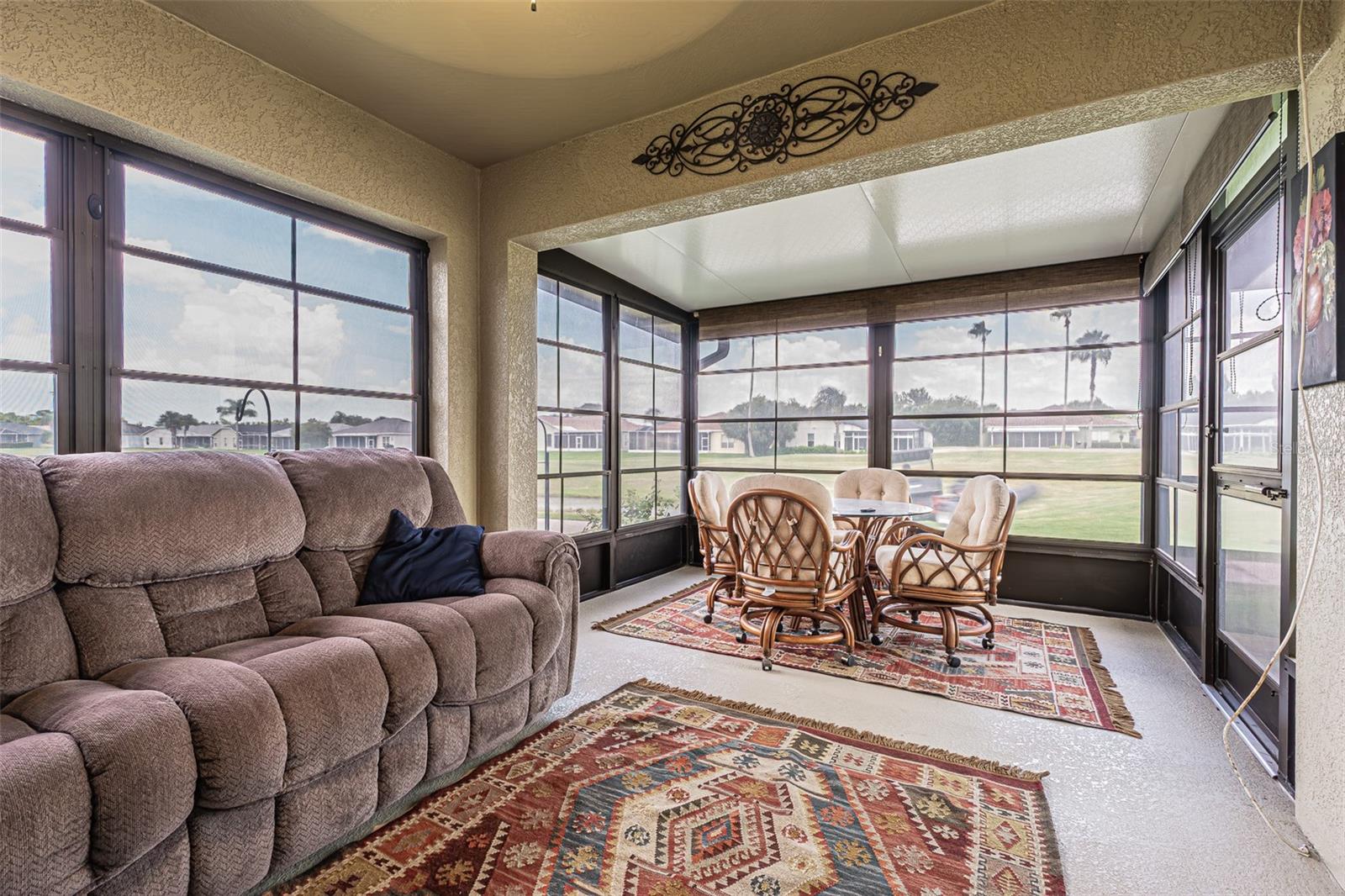 Extended, Enclosed Florida room with serene views!